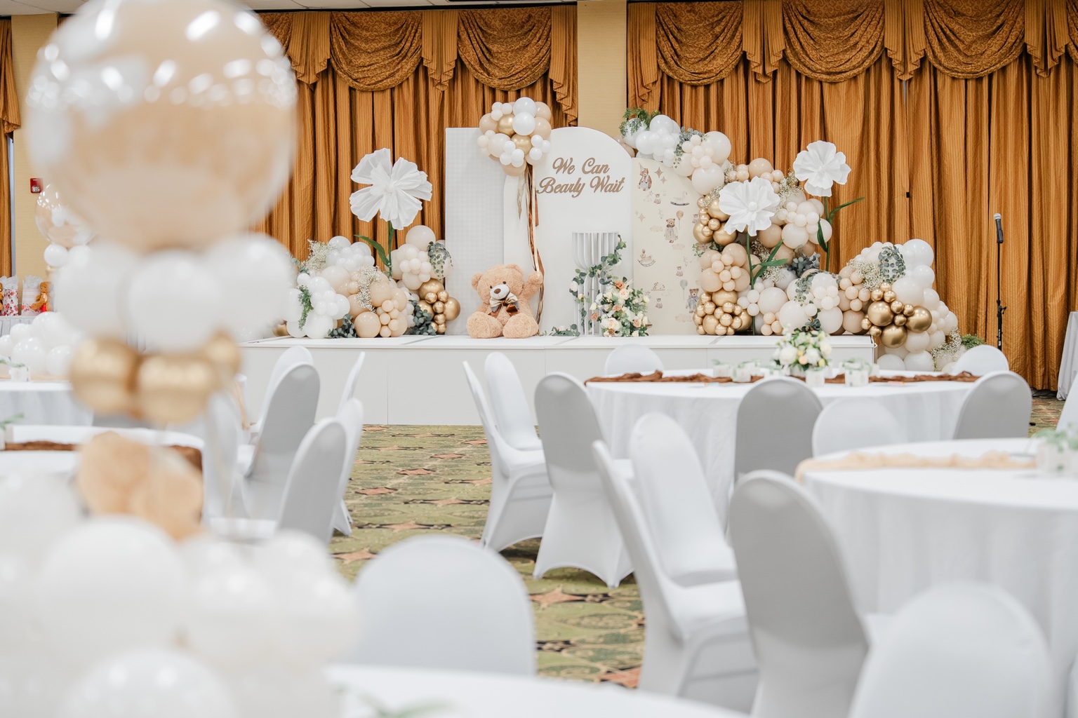 Details worth remembering: white and gold baby shower decor at Whispering Woods