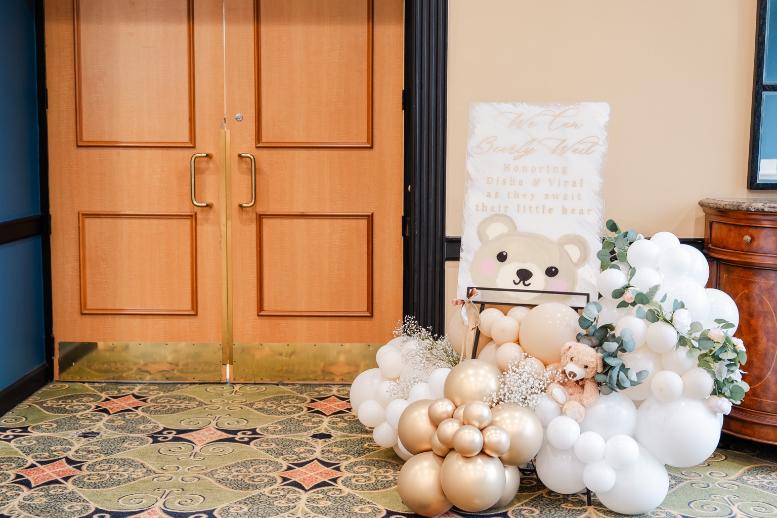 A warm welcome: white and gold baby shower decor at Whispering Woods